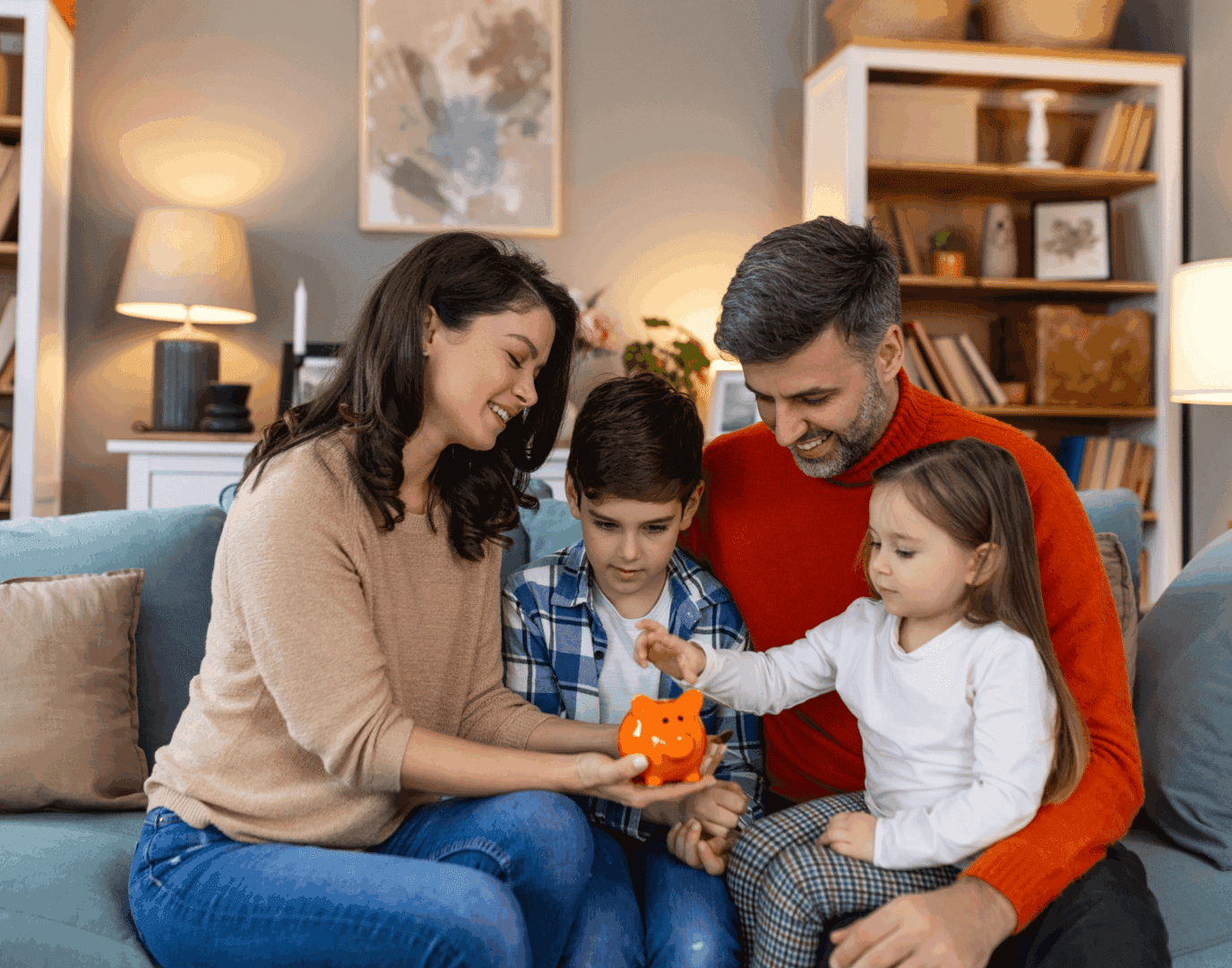 Family saving money in piggy bank together.