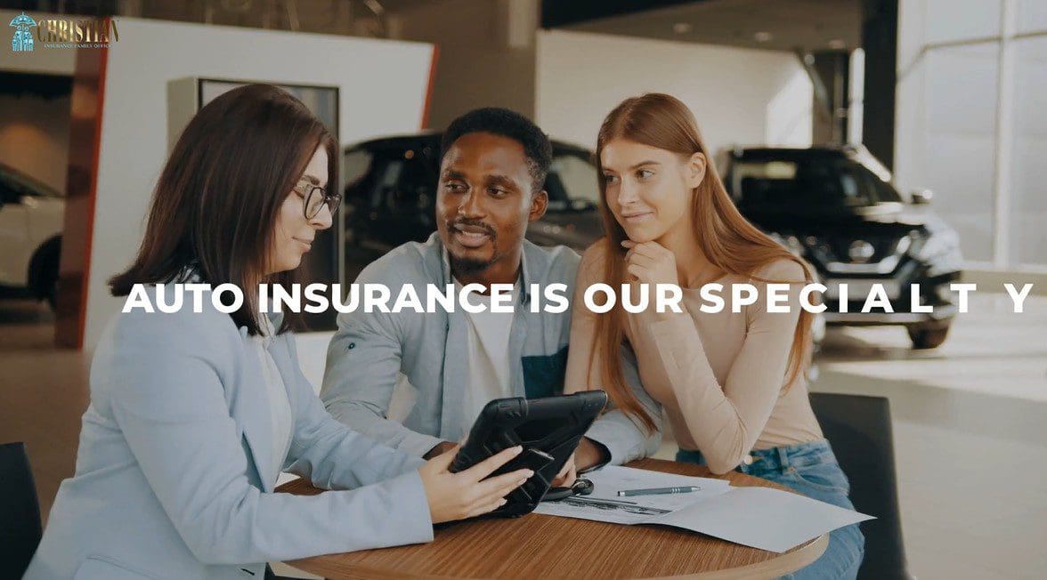 Insurance agent discussing policies with clients in an office setting.